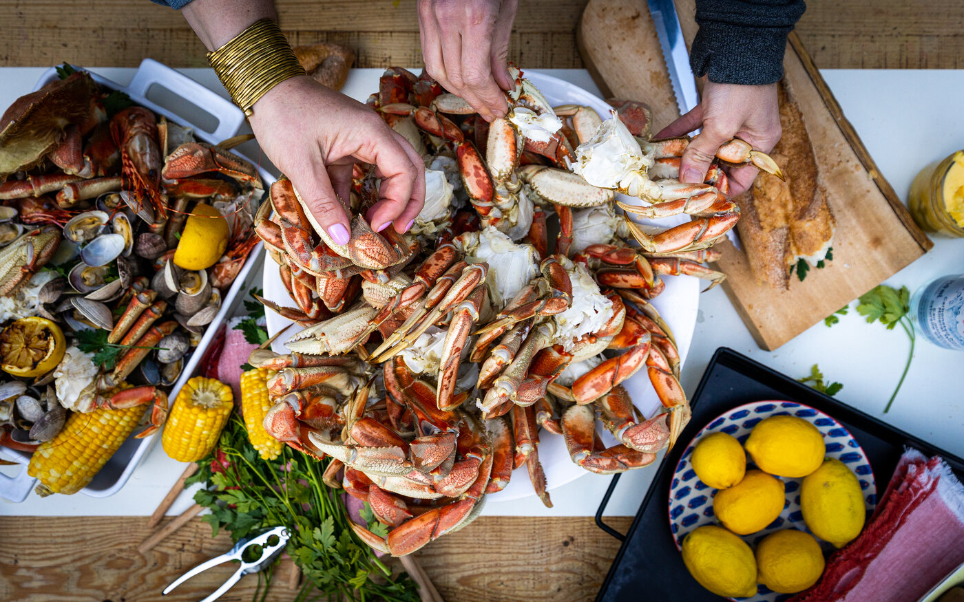 Full family-style BC Crab Boil spread at the Captain's Table, BC CrabFest